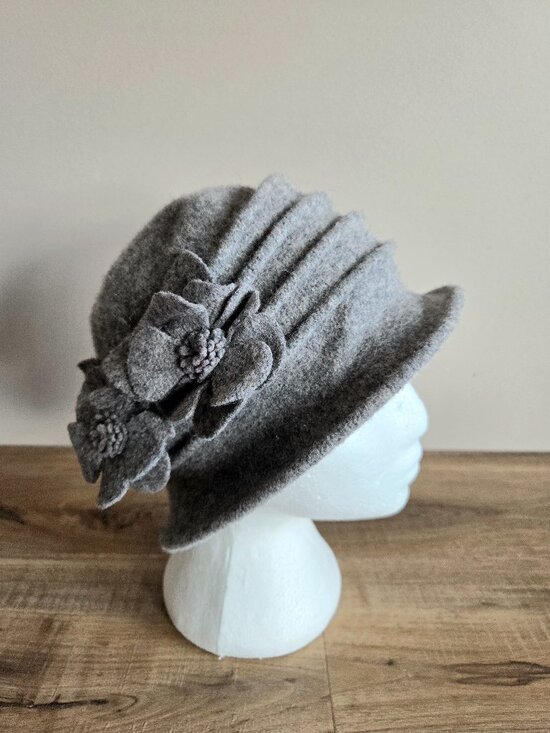 Accessories - Gray wool hat with floral details on the side.